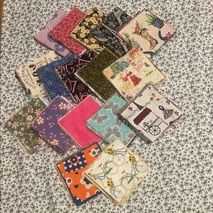 Assorted Patterned Fabric Squares 5”X5”. 340 blocks